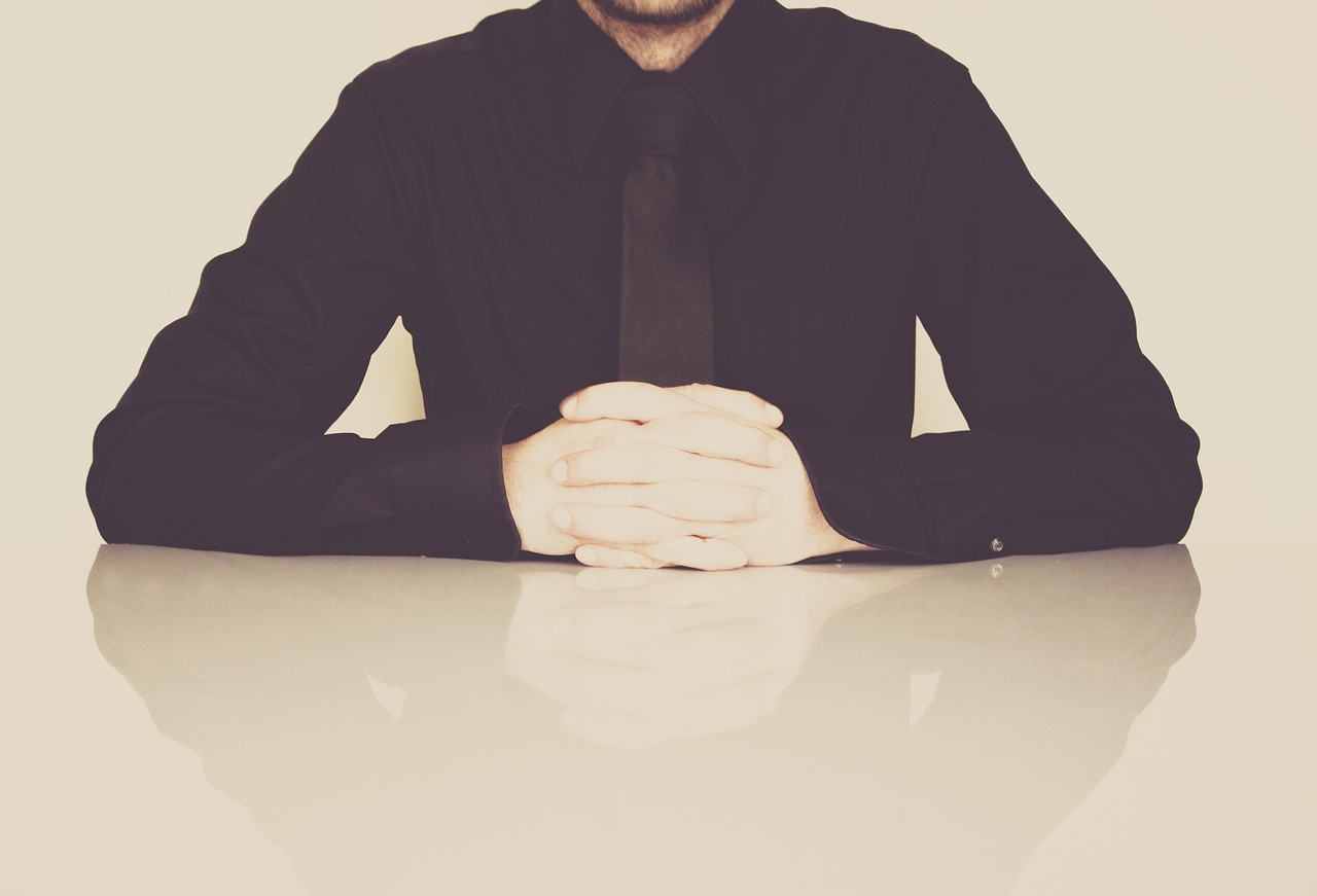 Businessman, office, necktie — Cannabis Cigarettes for a Relaxed and Enjoyable Smoke