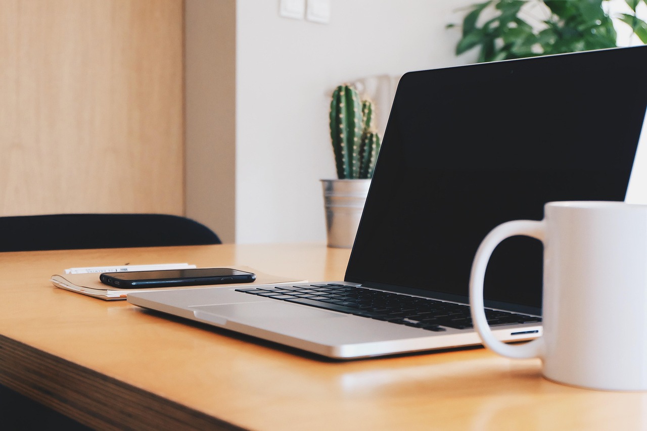 Office, desk, coffee cup — How a Franchise Digital Marketing Agency Can Help Grow Your Business