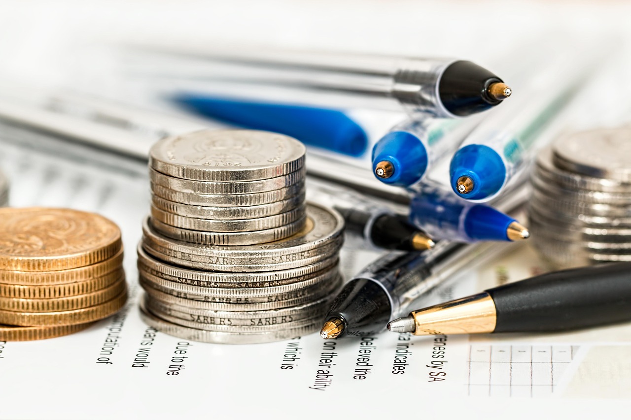 Coins, currency, investment — How Mutual Funds Can Help You Grow Wealth