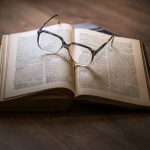 Glasses, book, education — Why Purity Standards Are Redefining Peptide Research in Canada